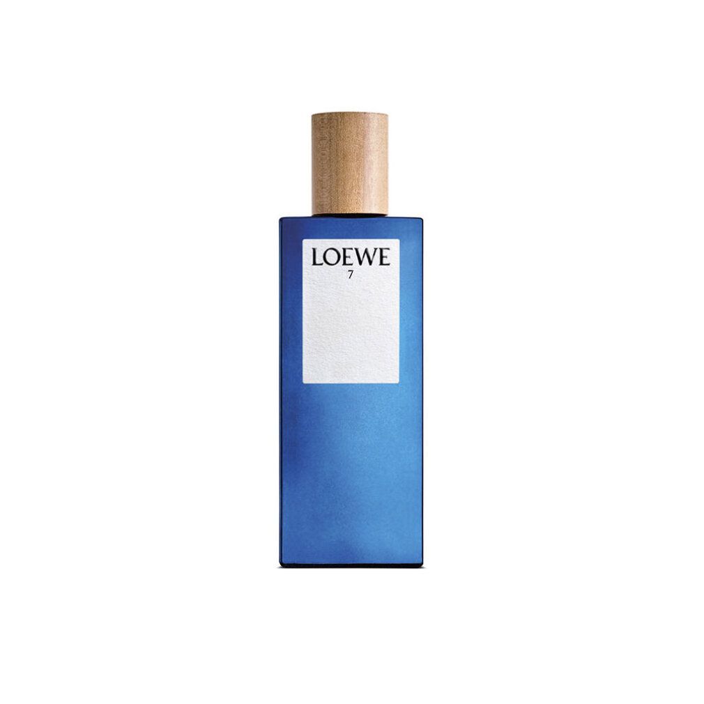 Flacon de parfum bleu avec bouchon en bois. Inscription LOEWE 7.