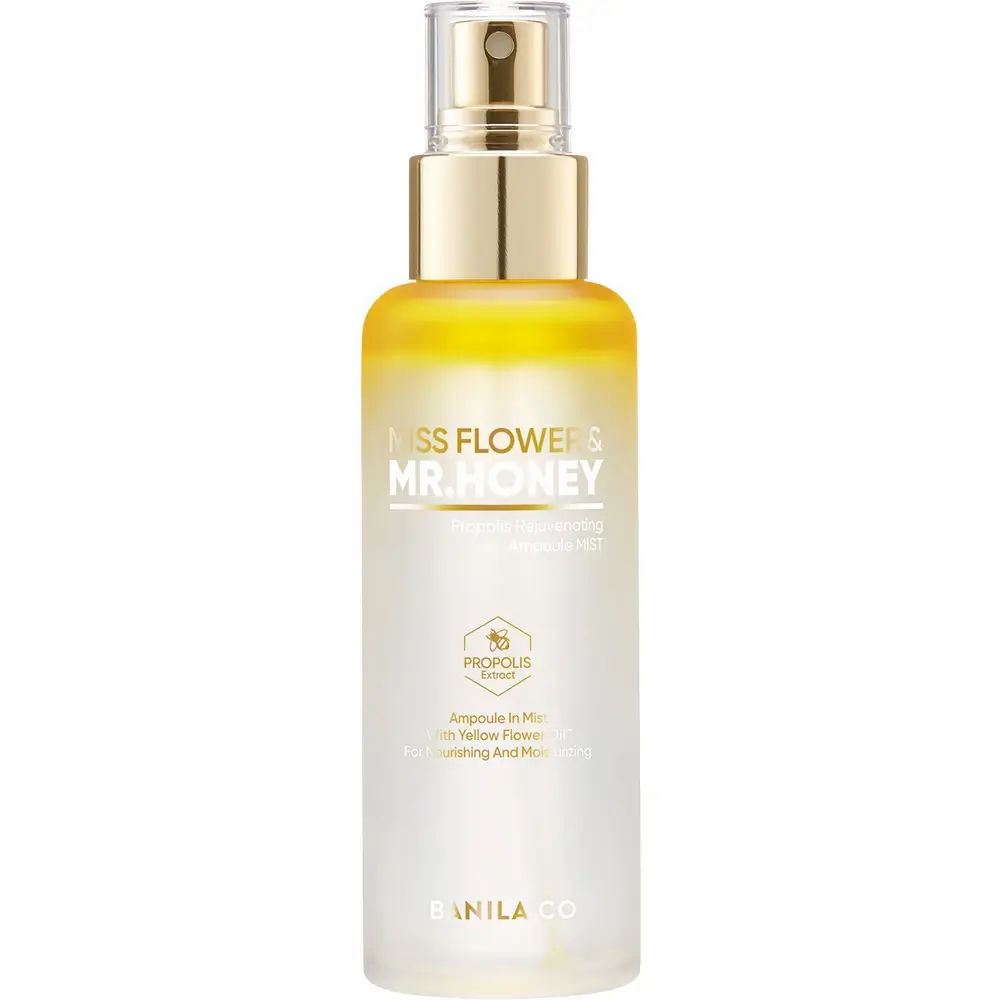 Gezichtssprayfles met gouden dop. Opschrift: Miss Flower & Mr. Honey. Geel-transparante vloeistof.