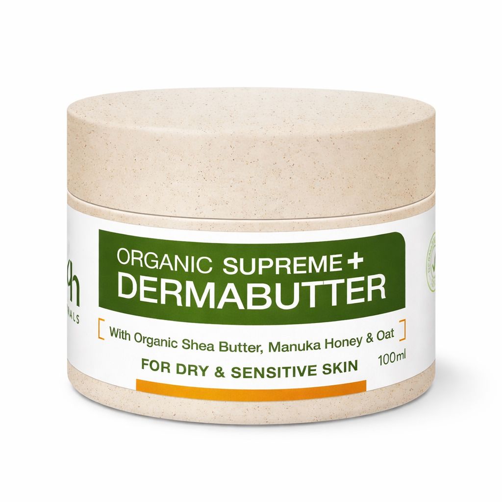 Beige pot met wit etiket. Opschrift: ORGANIC SUPREME + DERMABUTTER. Voor droge & gevoelige huid.