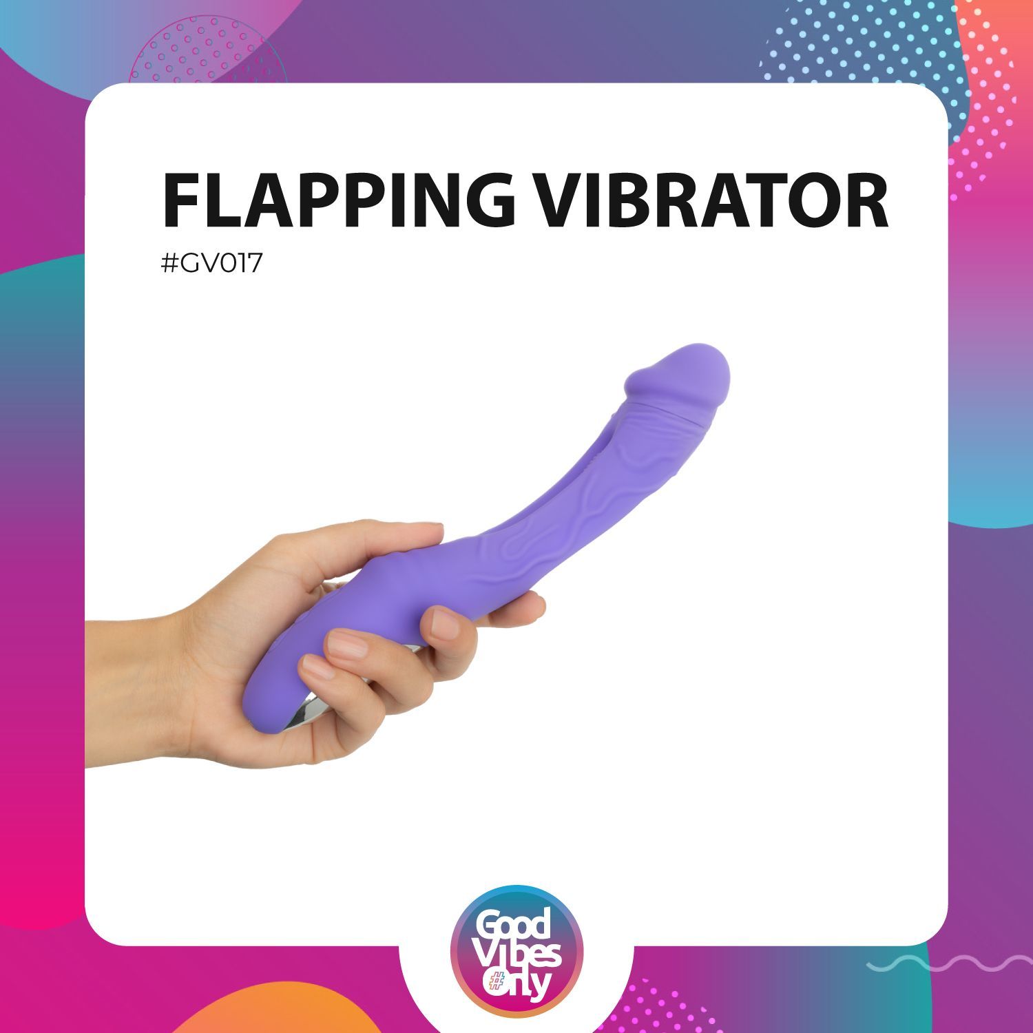 Vibrateur violet dans une main. Le vibrateur est légèrement incurvé et de forme allongée.
