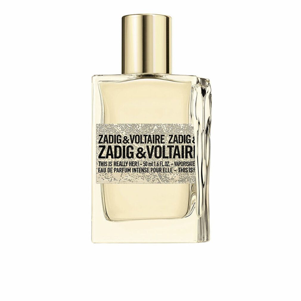 Flacon de parfum. Inscription : ZADIG & VOLTAIRE THIS IS REALLY HER. Bouchon doré, flacon rectangulaire.