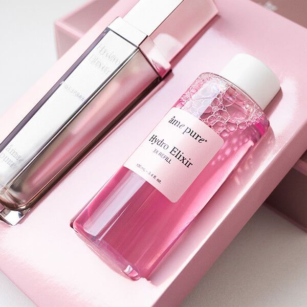 Spray et recharge âme pure Hydro Elixir dans un emballage rose.