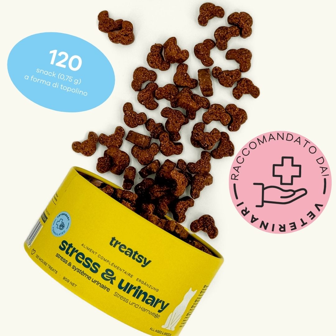 Boîte jaune « Treatsy Stress & Urinary ». Friandises marron et autocollant.