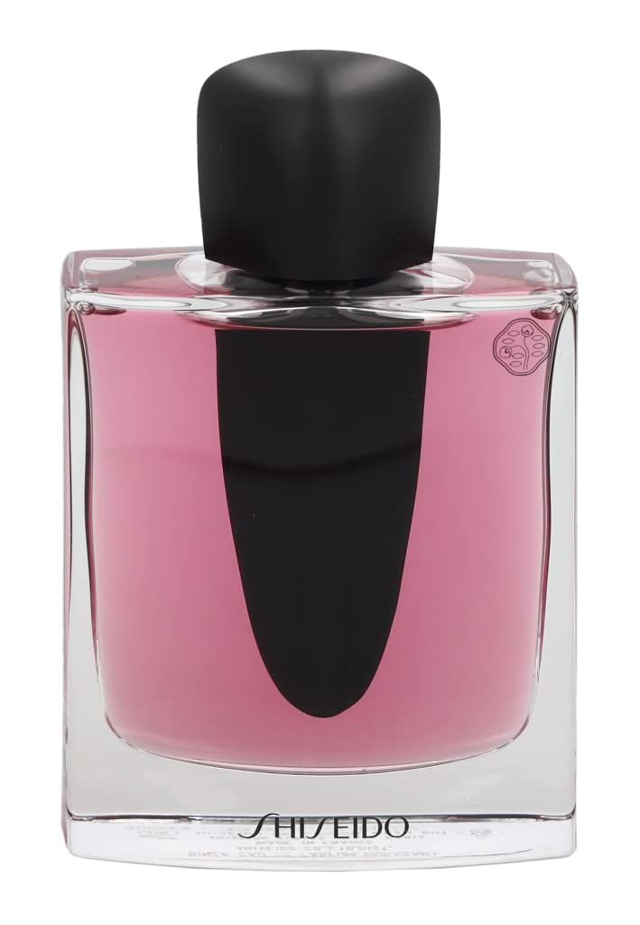 Vierkante glazen fles met roze vloeistof en zwarte dop. Shiseido-logo onderaan.