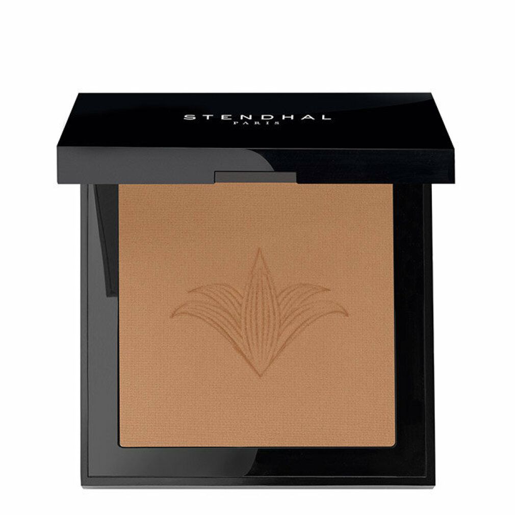 Poudre compacte Stendhal, couvercle noir. Forme carrée, couleur marron. Logo floral sur la poudre.