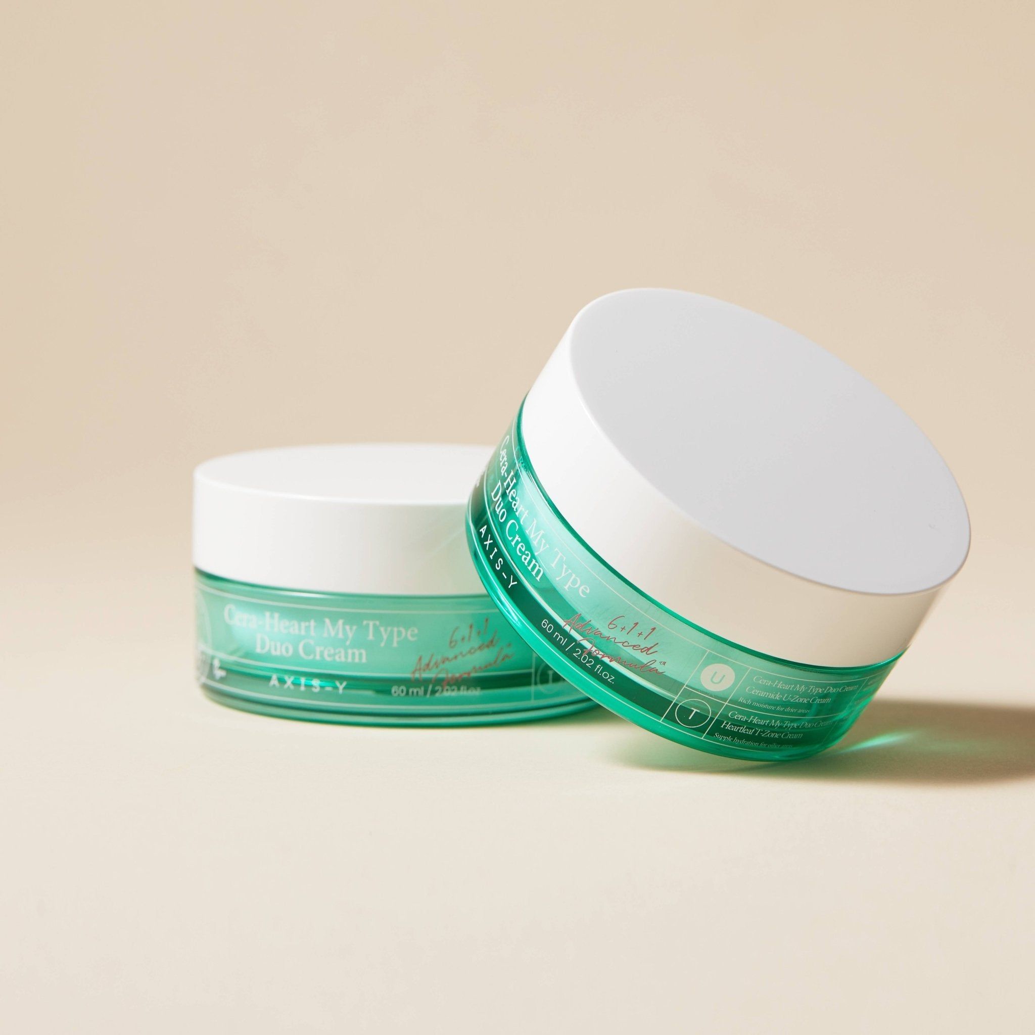 Twee groene crème potten met witte deksels. Opschrift: Cera-Heart My Type Duo Cream. Merk: AXIS-Y.