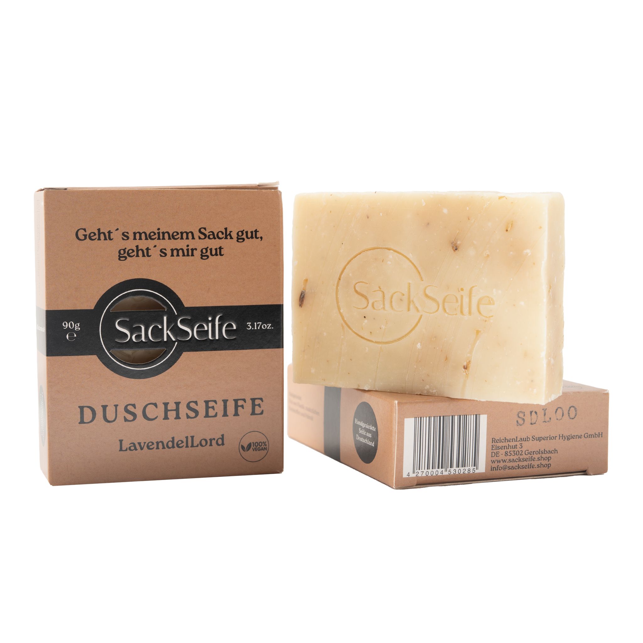 Zeep en verpakking. Opschrift "SackSeife", "Savon douche Lavendellord". Bruine verpakking met productinformatie.