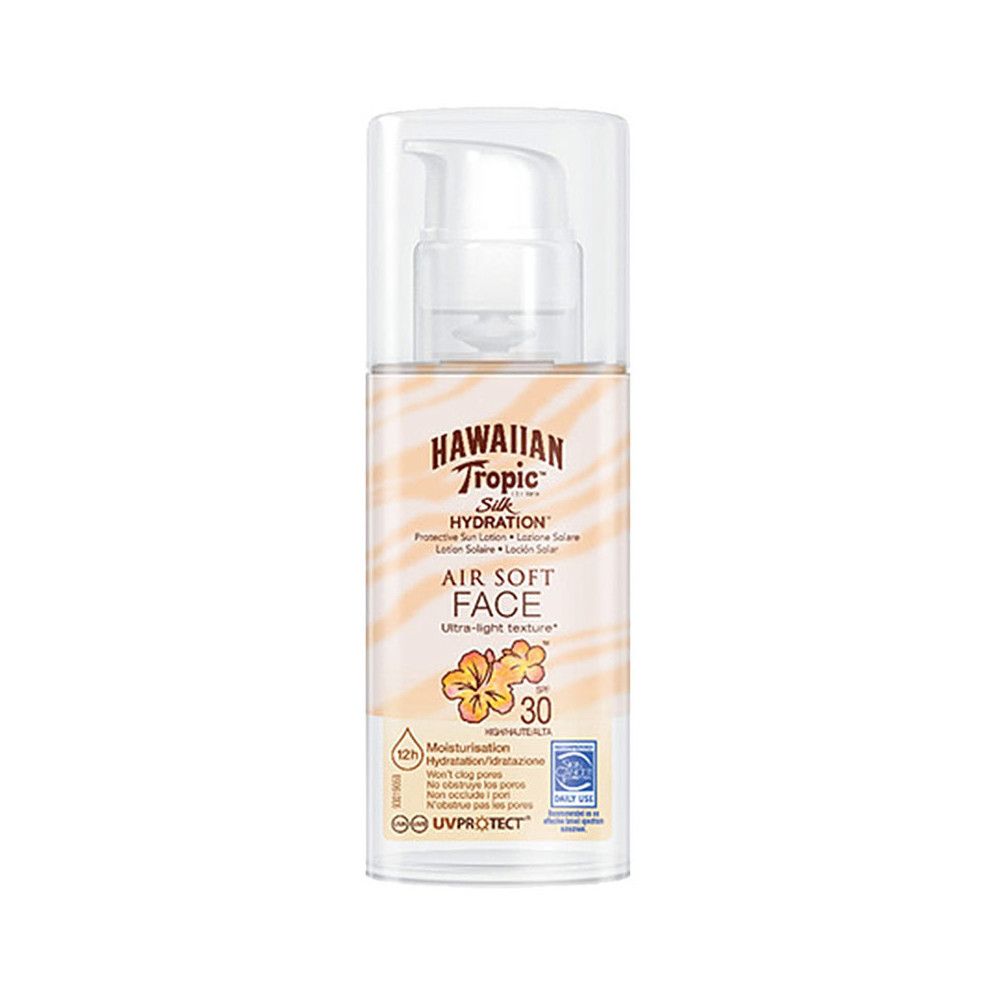 Flacon de crème solaire avec pompe. Inscription: Hawaiian Tropic Silk Hydration Air Soft Face. SPF 30. Avec bouchon transparent.