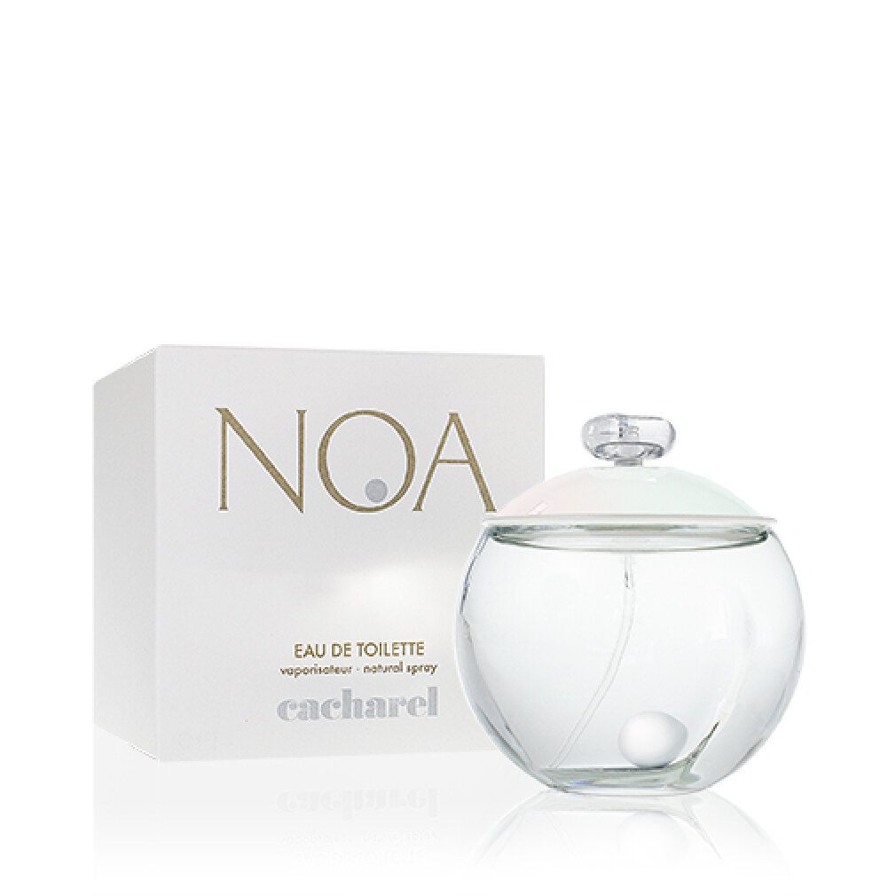 Flacon rond en verre avec bouchon et boîte. La boîte porte les inscriptions "NOA" et "cacharel".