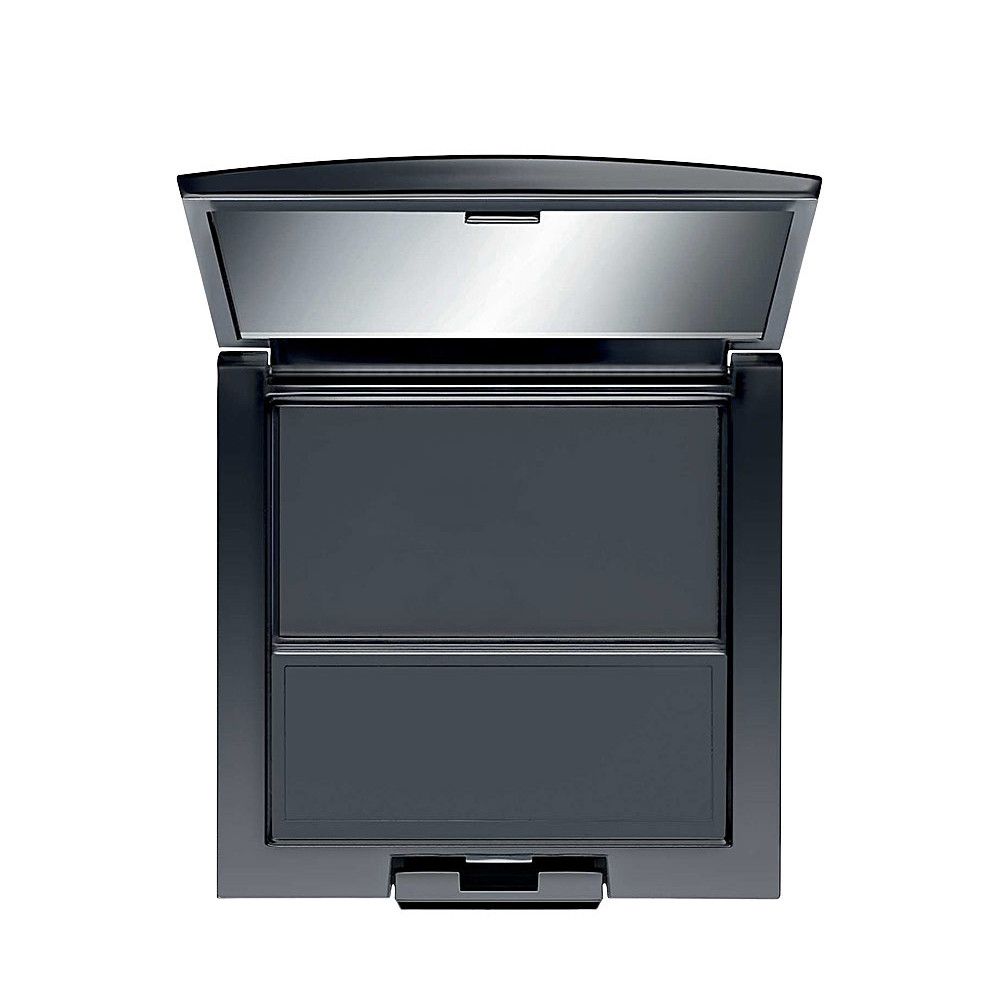 Boîte à beauté Trio noire ouverte. Contient deux compartiments vides et un miroir dans le couvercle. Forme carrée.