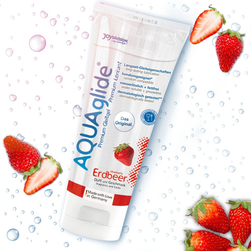 Tube AQUAglide Erdbeere, entouré de fraises et gouttes d'eau. Inscription: Joydivision, gel lubrifiant premium, goût fraise.