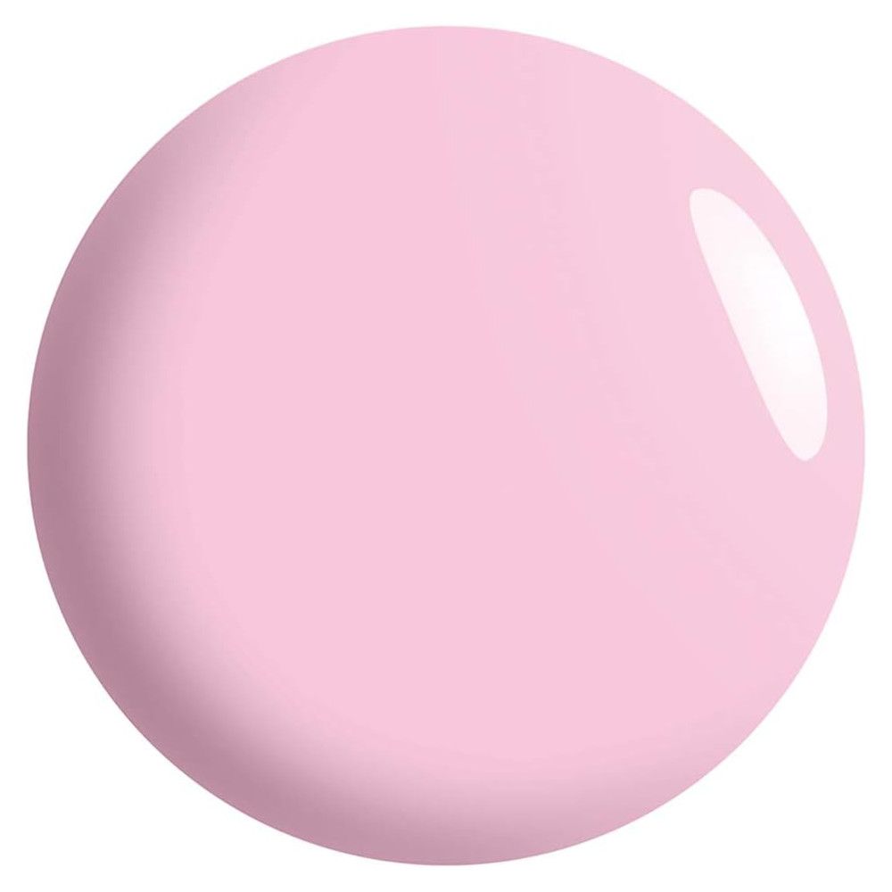 Goutte de vernis à ongles rose. Surface brillante avec reflet clair.