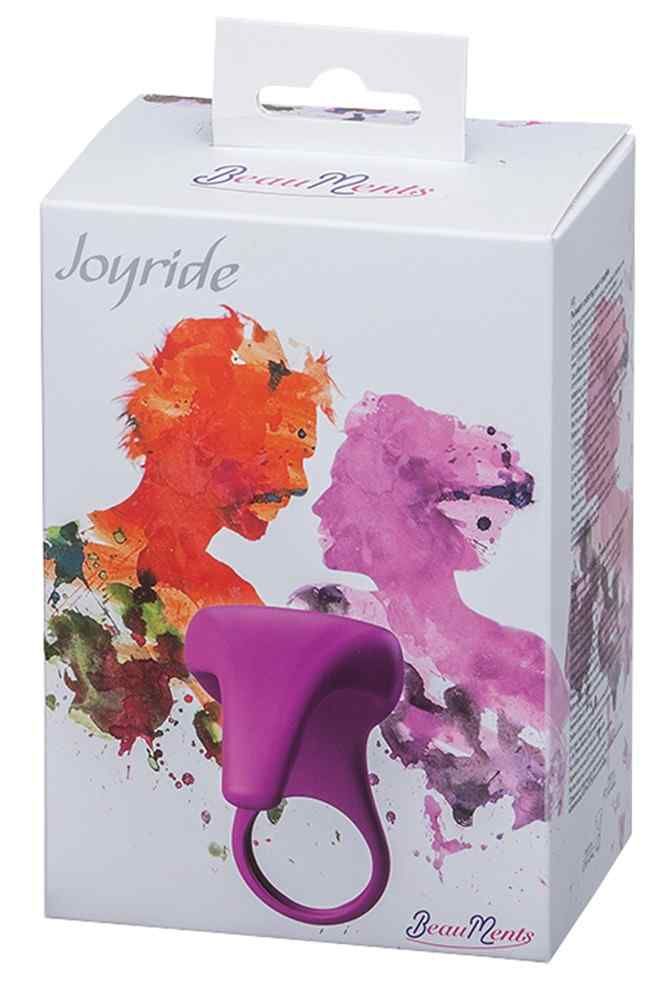 Anneau violet avec embout en forme de T. Emballage avec le nom du produit Joyride et le logo BeauMents. Illustration de deux personnes.