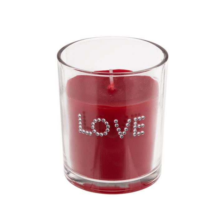 Bougie parfumée rouge dans un verre. Inscription "LOVE" avec strass. Bougie dans un récipient en verre.