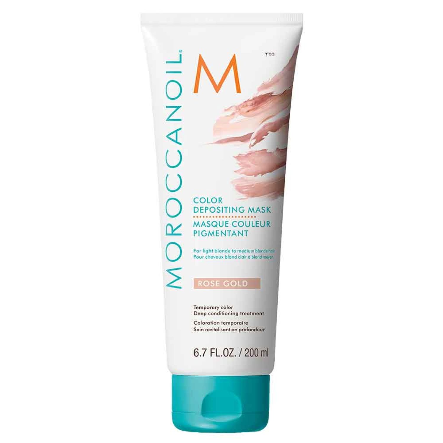 Tube blanche avec bouchon turquoise. Inscription: Moroccanoil, Masque Couleur Pigmentant, Rose Gold. Contenu: 200 ml.