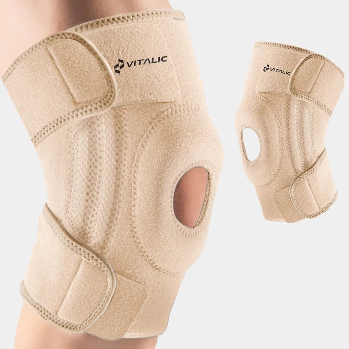 Genouillère beige avec ouverture rotulienne et fermetures velcro. Marque : VITALIC.