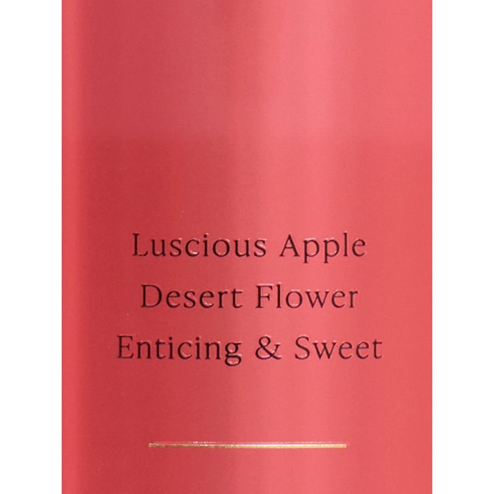 Flacon rouge avec texte: Luscious Apple, Desert Flower, Enticing & Sweet. Bande dorée.