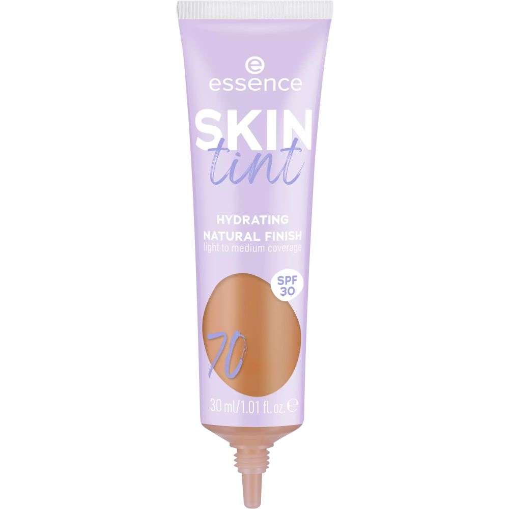 Fond de teint teinté dans un tube violet. Inscription : "SKIN tint", "Hydrating", "SPF 30". Teinte 70.