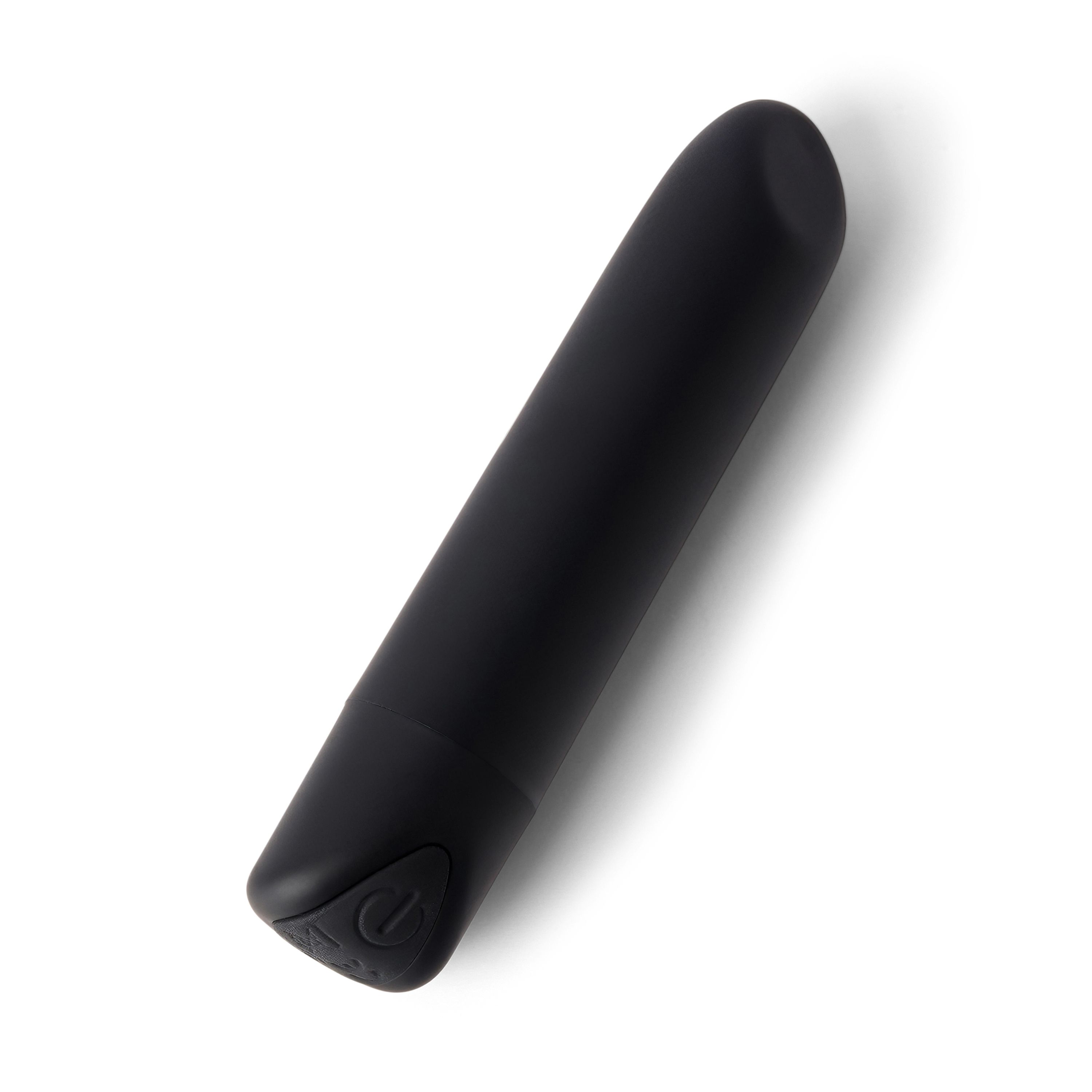 Produit de bien-être cylindrique noir. Avec bouton d'alimentation. Sur fond blanc.