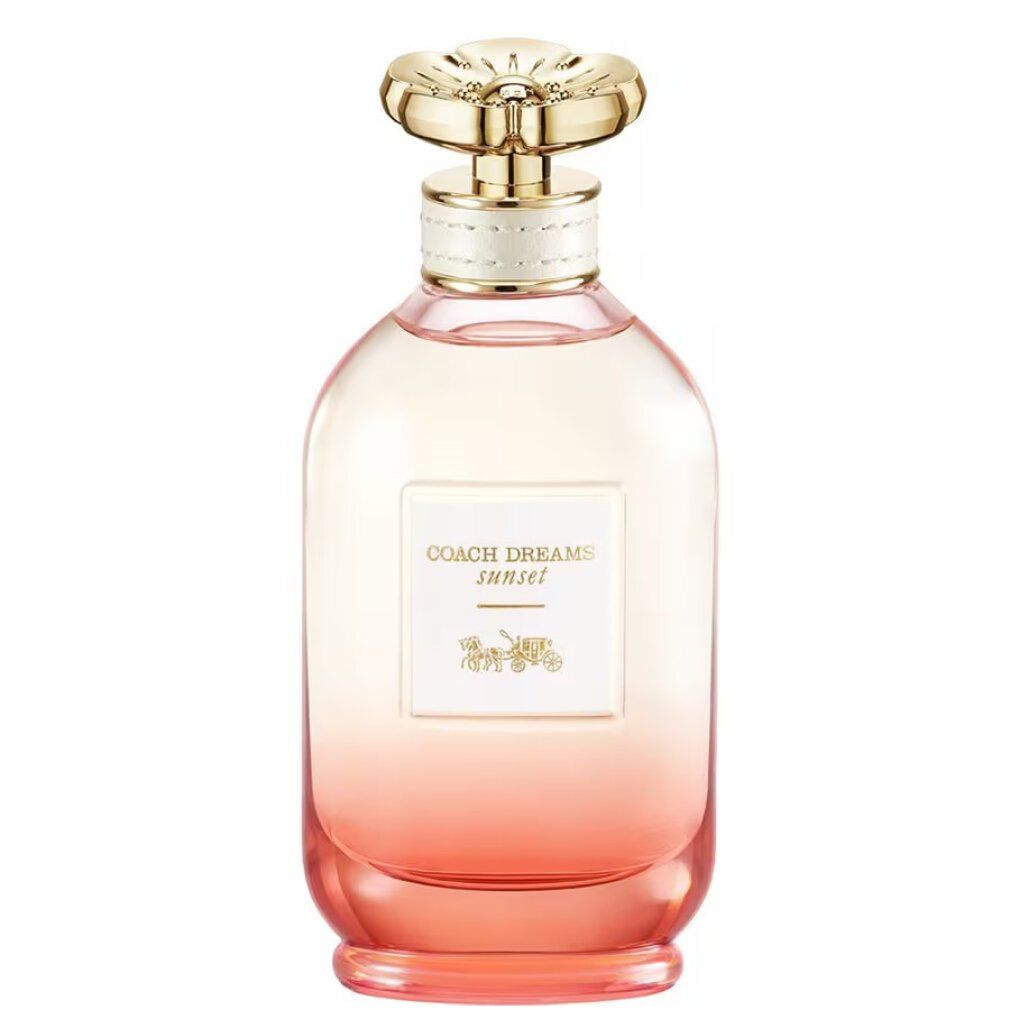 Flacon de parfum avec bouchon doré. Inscription: Coach Dreams Sunset. Dégradé de rose à orange.