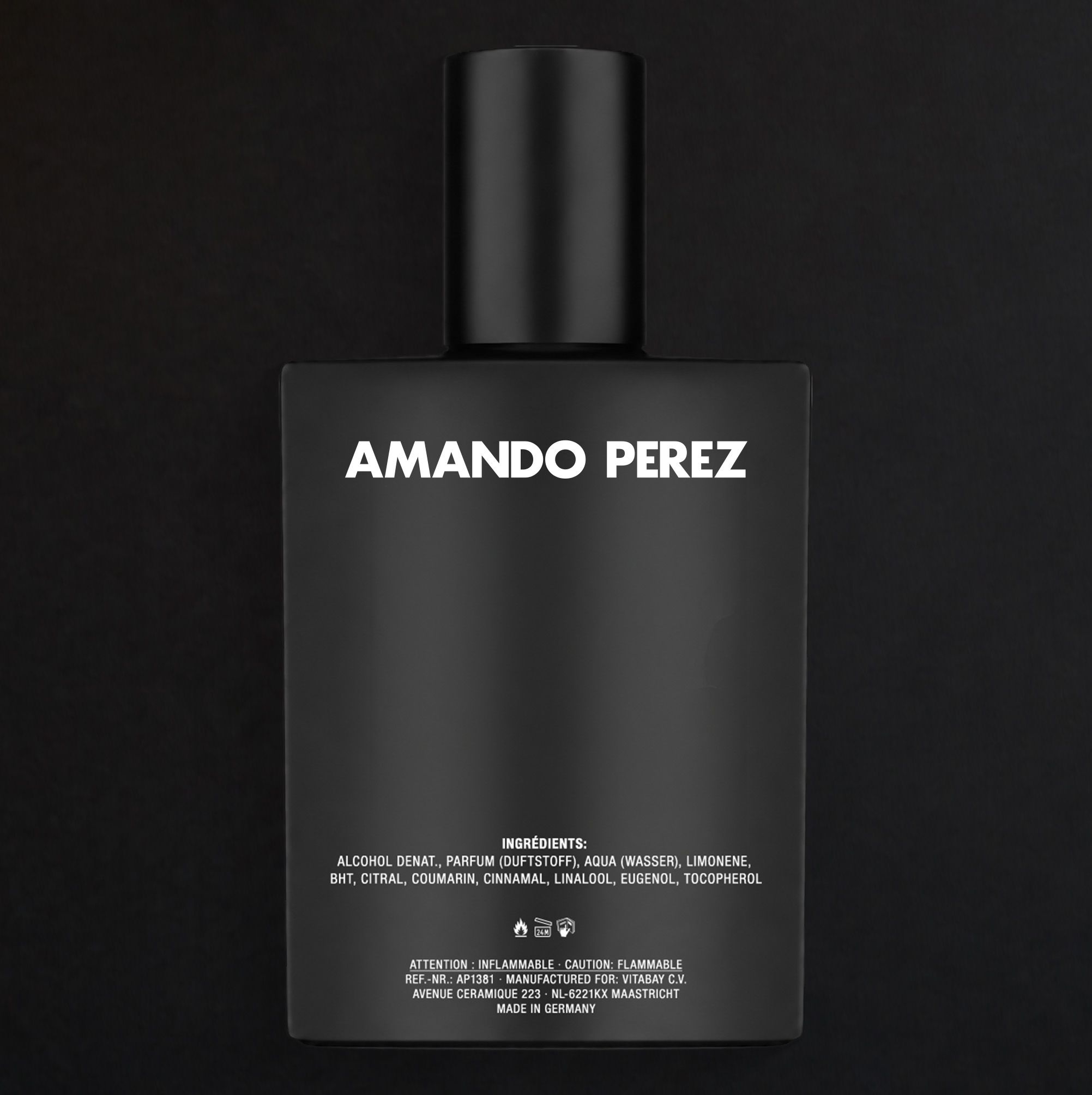 Arrière d'un flacon noir avec ingrédients et avertissements. "Amando Perez".