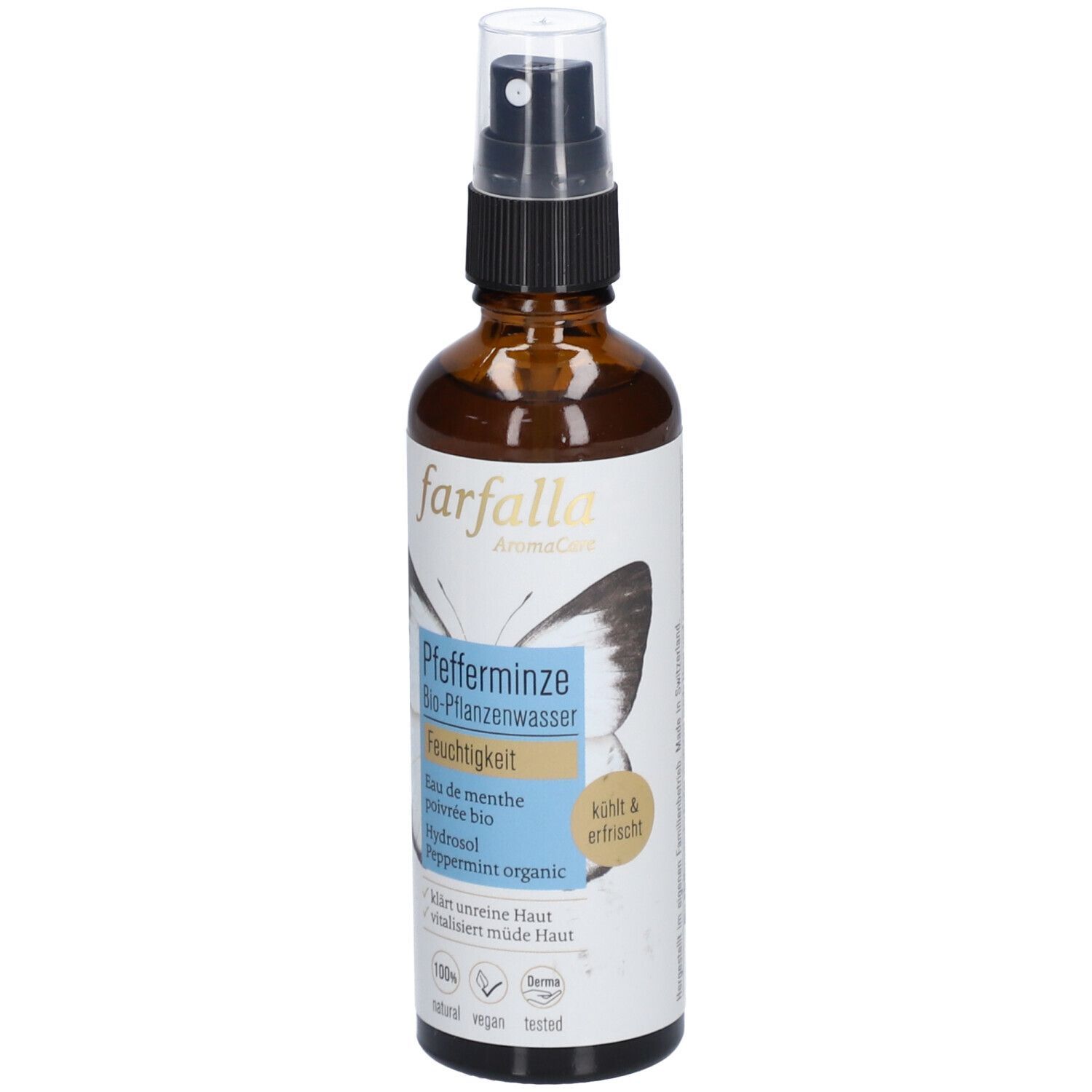 Flacon en verre brun avec vaporisateur. Étiquette avec nom du produit, motif papillon et texte. Certifications.