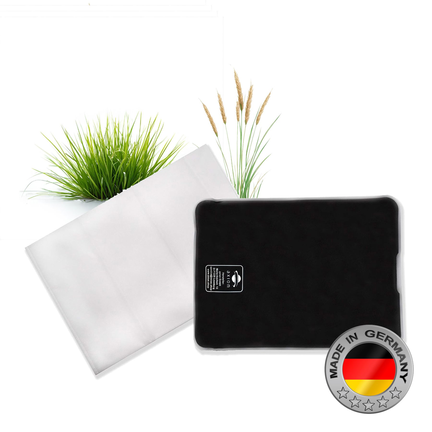 Zwart warmtekussen met vlieshoes. Made in Germany-label.