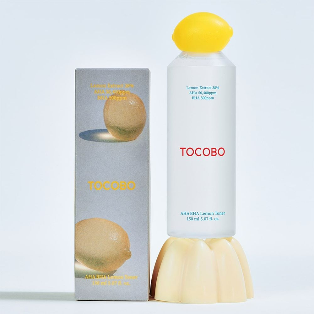 Citroen tonerfles met verpakking. Opschrift TOCOBO. Tekst: AHA BHA Lemon Toner, 150 ml.