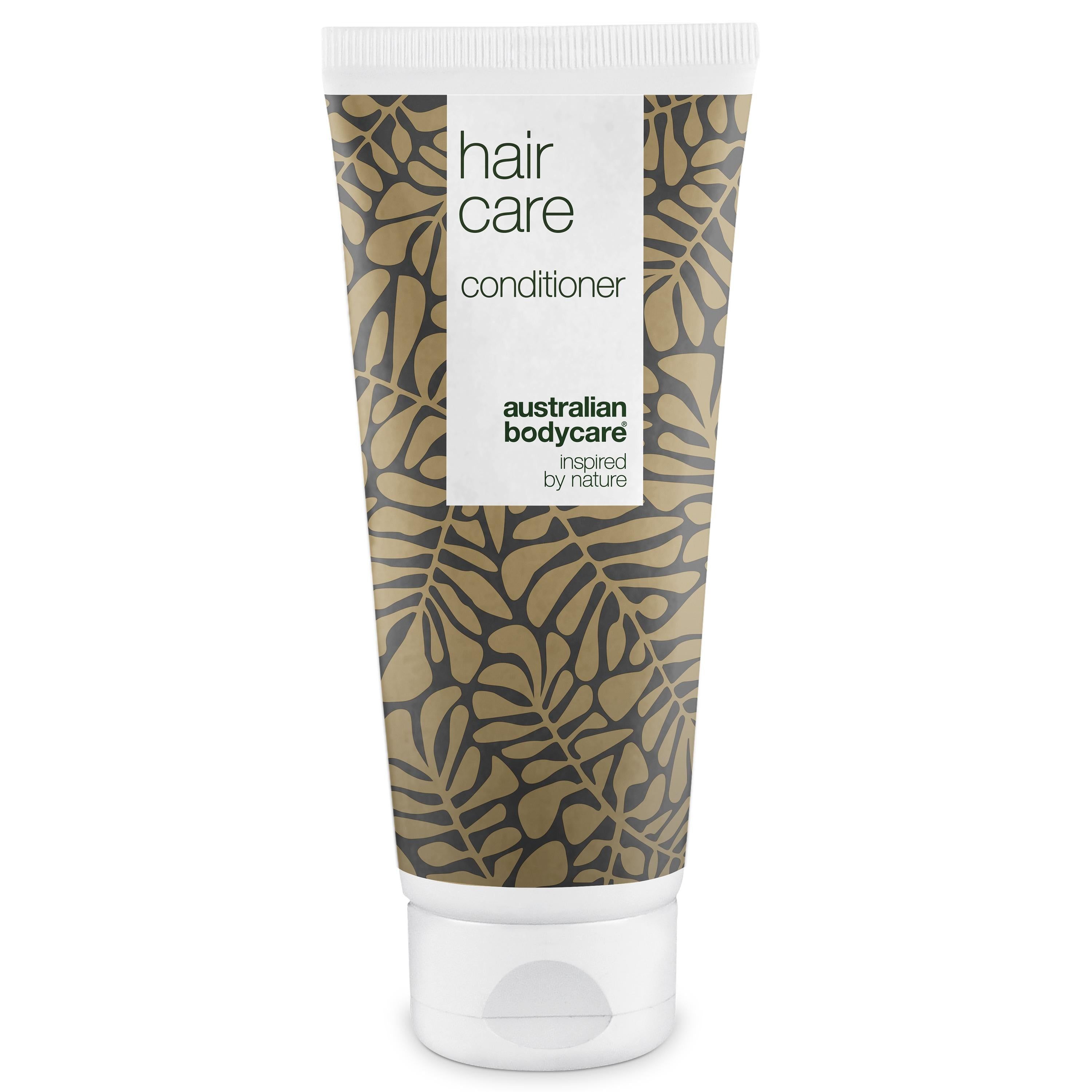 Tube de revitalisant capillaire. Bouchon blanc, motif doré. Inscription : Hair Care, Conditioner, Australian Bodycare.