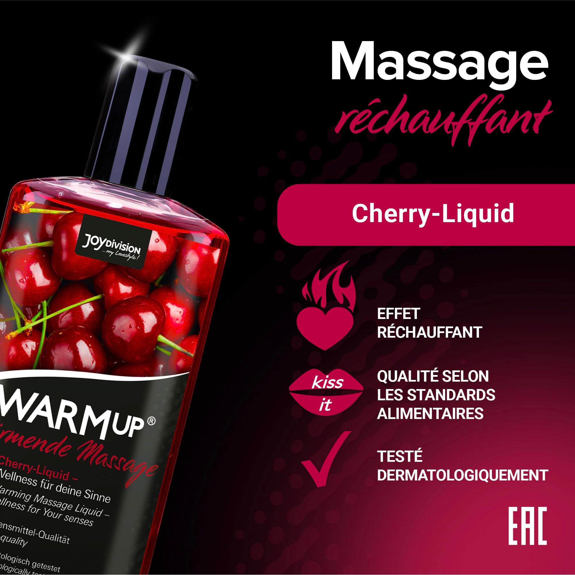 Bouteille d'huile de massage à la cerise, avec des cerises et des éclaboussures.