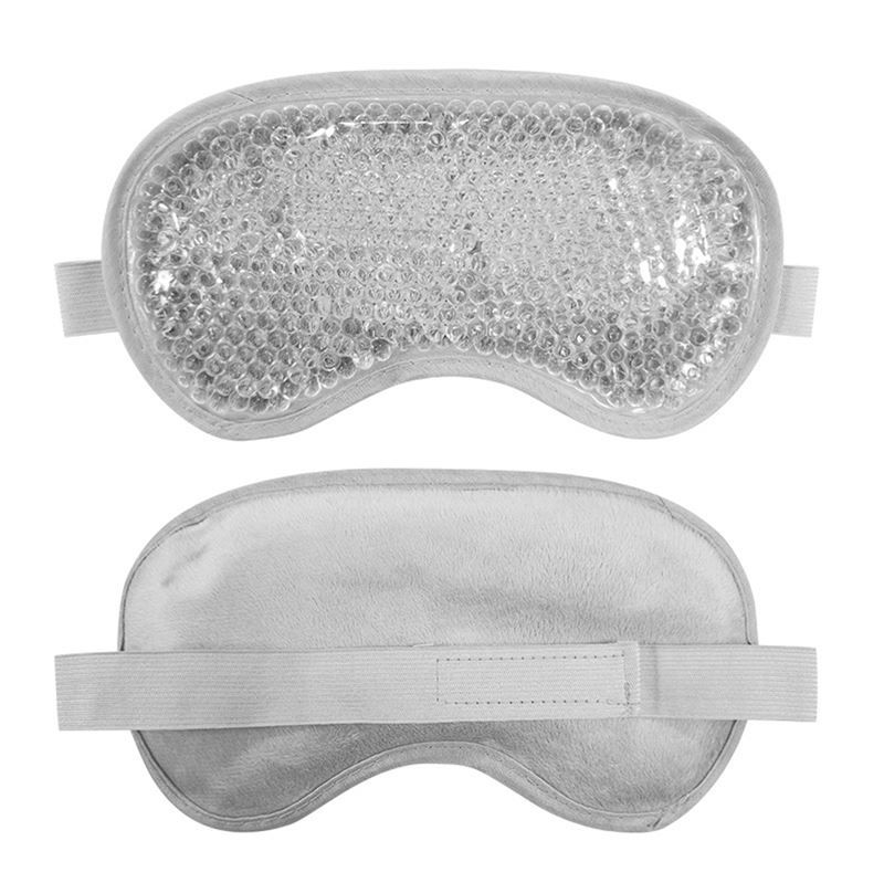 Grijs oogmasker met parelvulling en elastische banden.