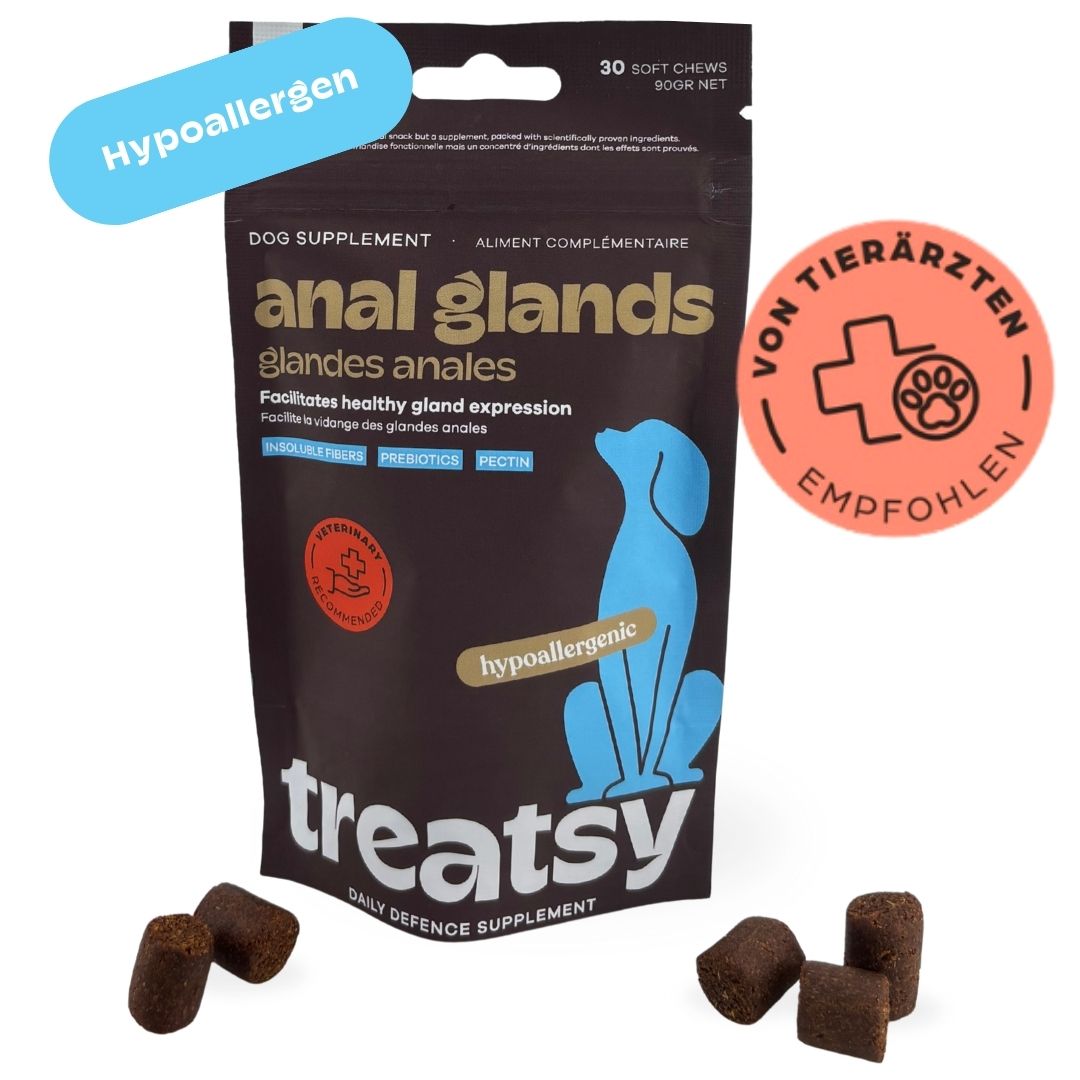 Sachet de complément alimentaire. Comprimés bruns à côté. Inscription : Hypoallergénique, recommandé par les vétérinaires.