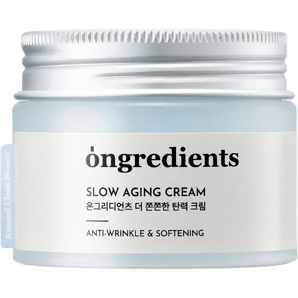 Pot de crème bleu avec couvercle argenté. Inscription : Ongredients, Slow Aging Cream, Anti-Wrinkle & Softening.