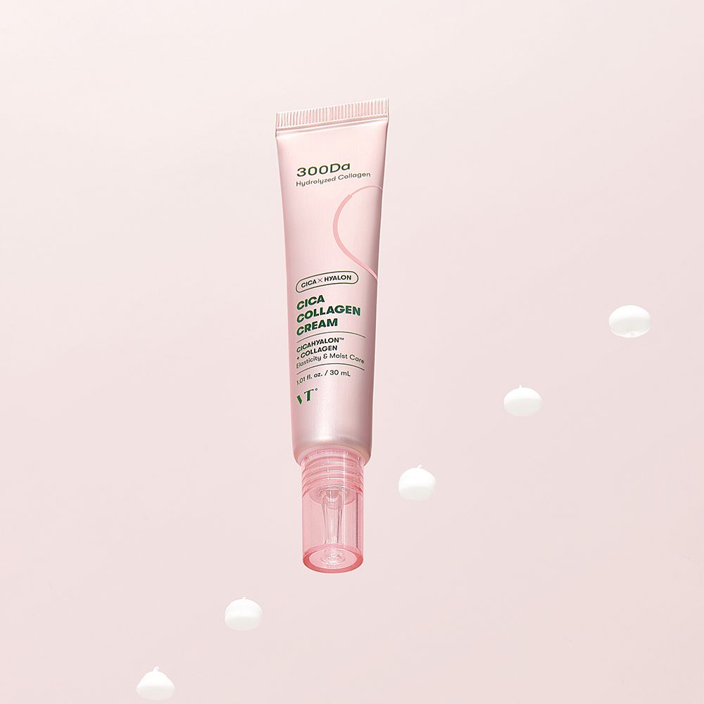 Tube rose avec crème. 300Da, Cica Kollagen Creme. Des gouttes blanches tombent.