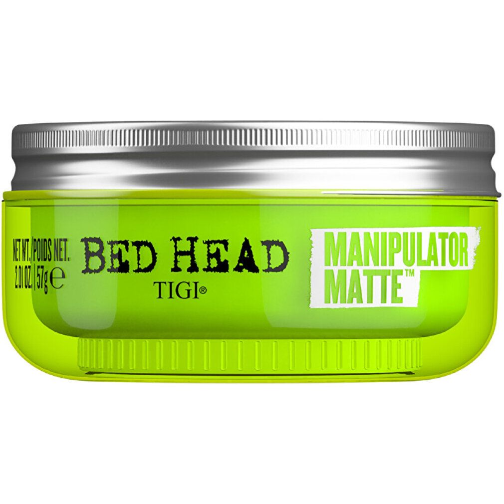 Pot vert avec couvercle argenté. Inscription: BED HEAD, MANIPULATOR MATTE, TIGI. Nom du produit et marque clairement visibles.