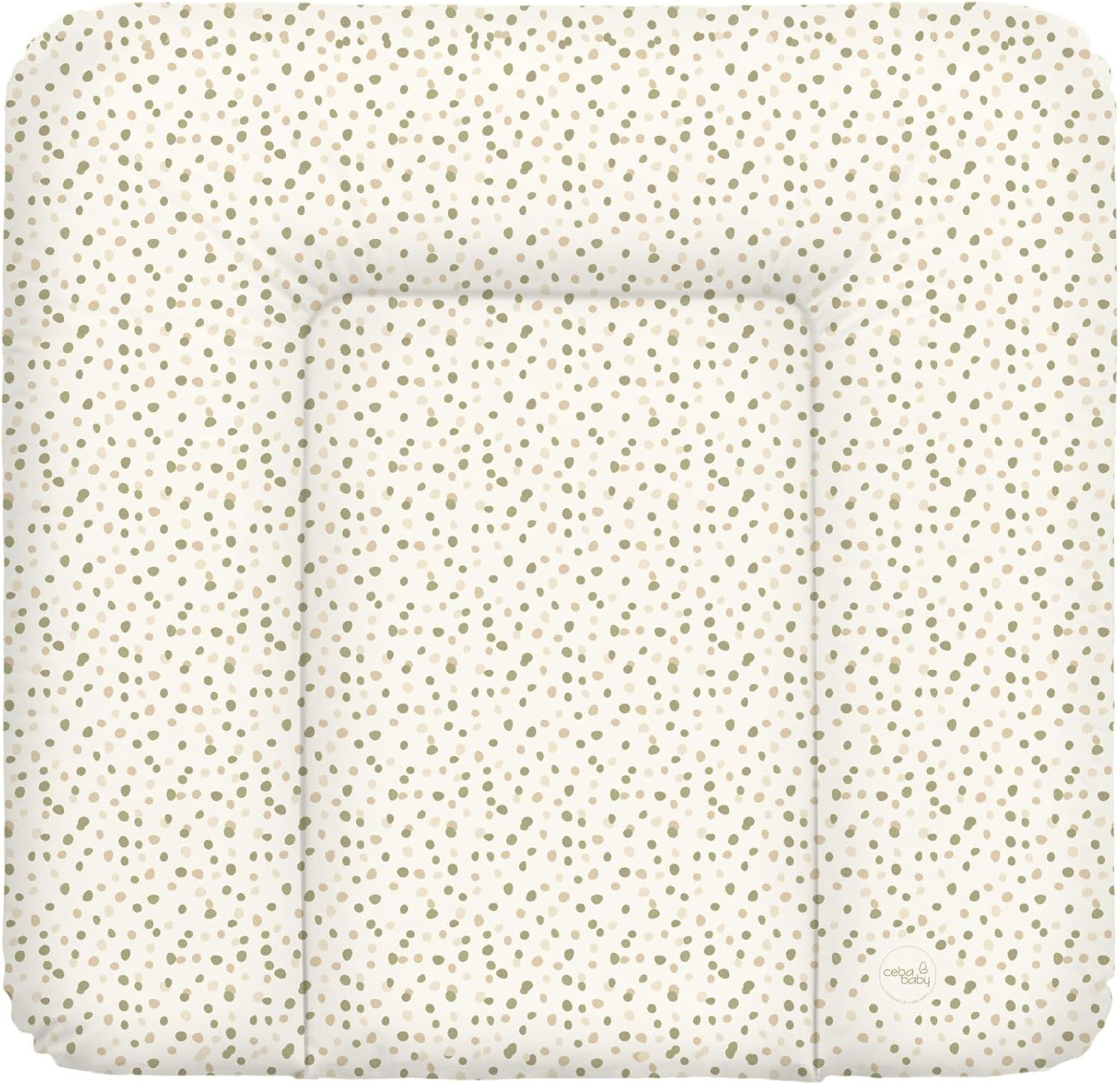 Verschoonkussen met stippenpatroon. Rechthoekige vorm met verhoogde zijkanten. Beige basis met bruine stippen.