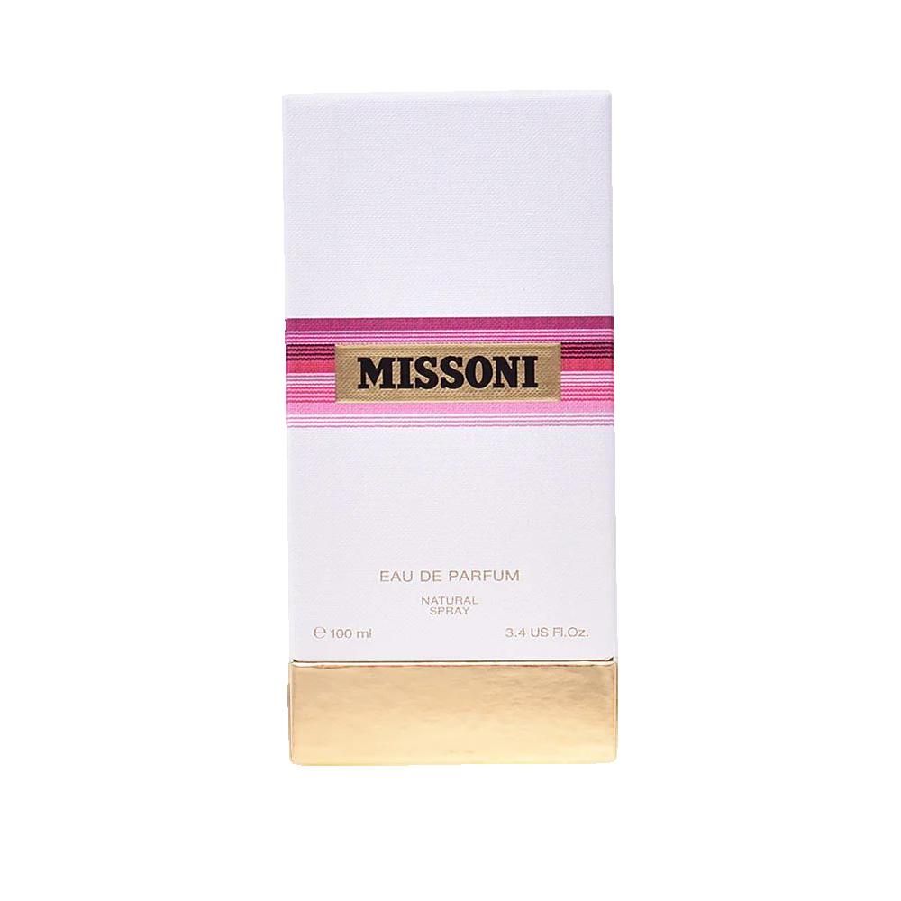 Witte rechthoekige doos met roze strepen en gouden bodem. Opschrift: MISSINI, Eau de Parfum, Natural Spray.