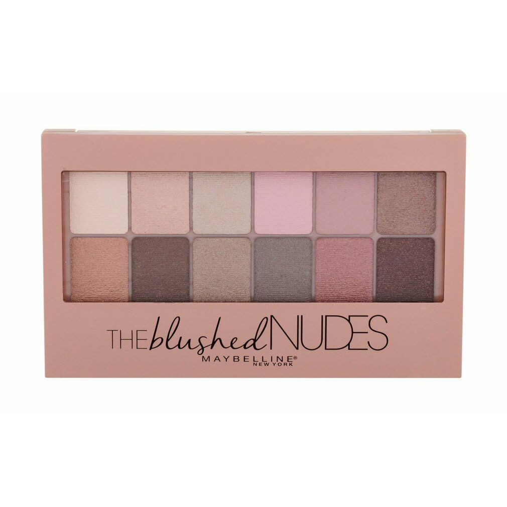 Palette de fards à paupières avec 12 teintes. Emballage rose doré. Inscription : THE blushed NUDES, MAYBELLINE NEW YORK.