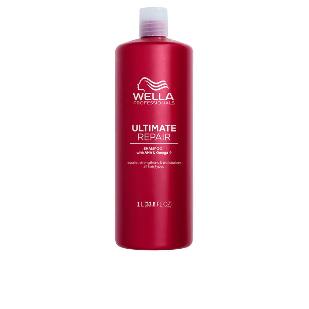 Flacon de shampooing rouge avec bouchon blanc. Inscription : Wella Professionals Ultimate Repair Shampoo. 1 L.