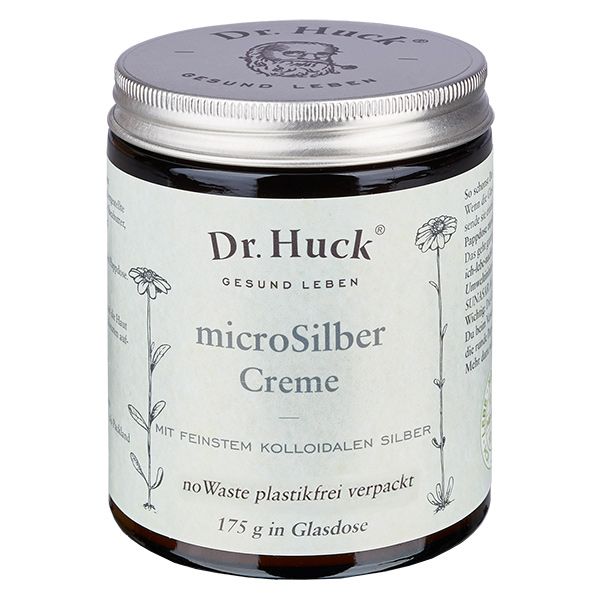 Pot en verre avec couvercle argenté et inscription Dr. Huck microSilber Creme. Illustrations florales.