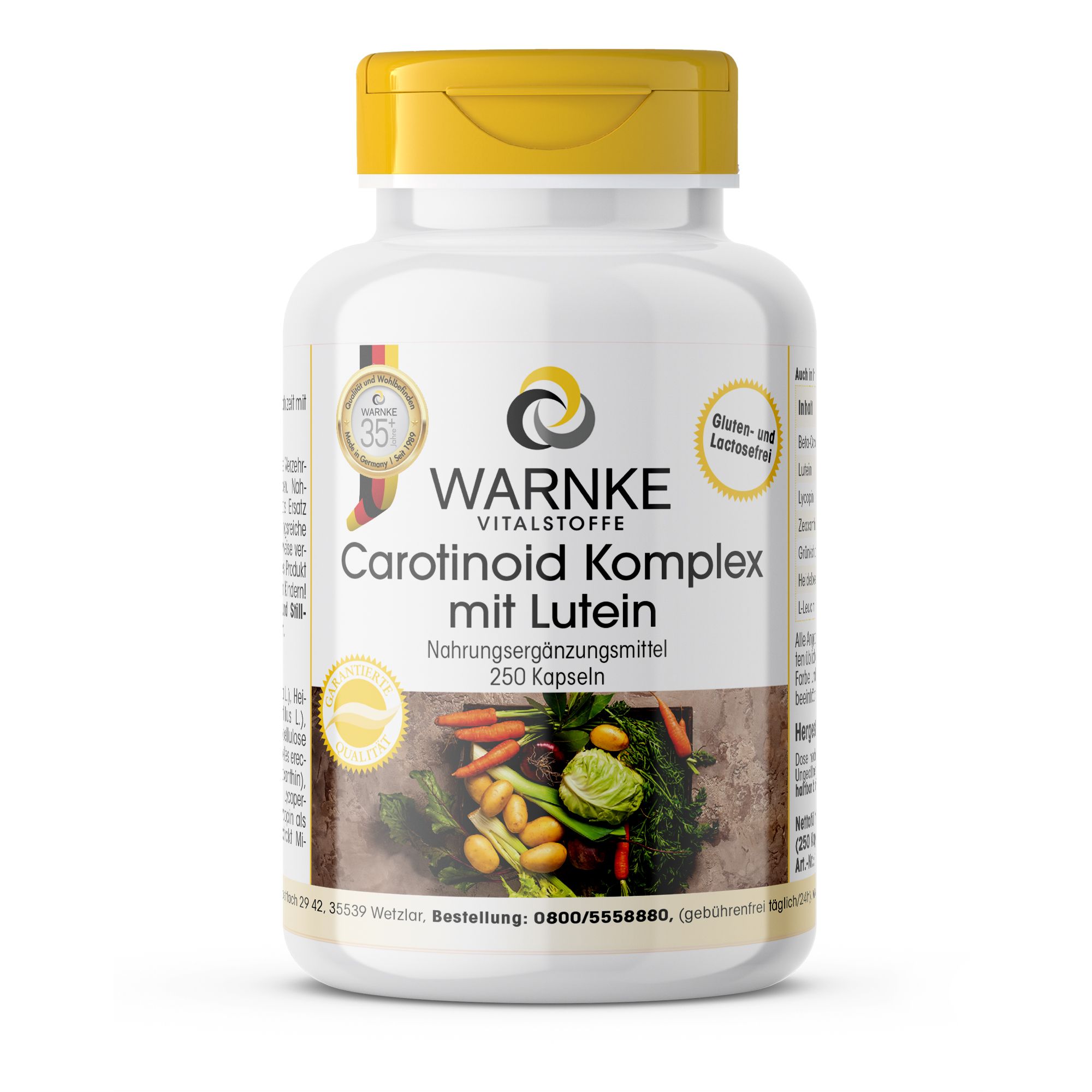 Witte fles met gele dop. Opschrift: Warnke Vitalstoffe Carotinoid Komplex mit Lutein. 250 capsules. Met groente-afbeelding.