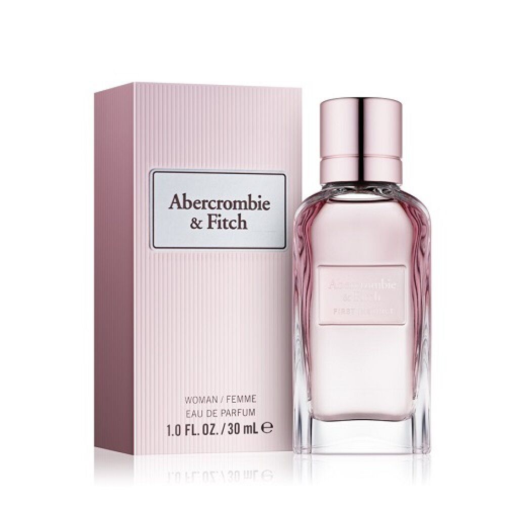Roze fles met roze verpakking. Opschrift: Abercrombie & Fitch, First Instinct, Eau de Parfum, Woman.