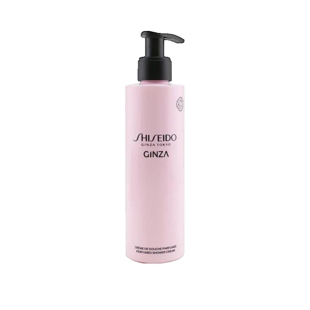 Flacon rose avec pompe noire. Inscription: Shiseido Ginza. Crème de Douche Parfumée.