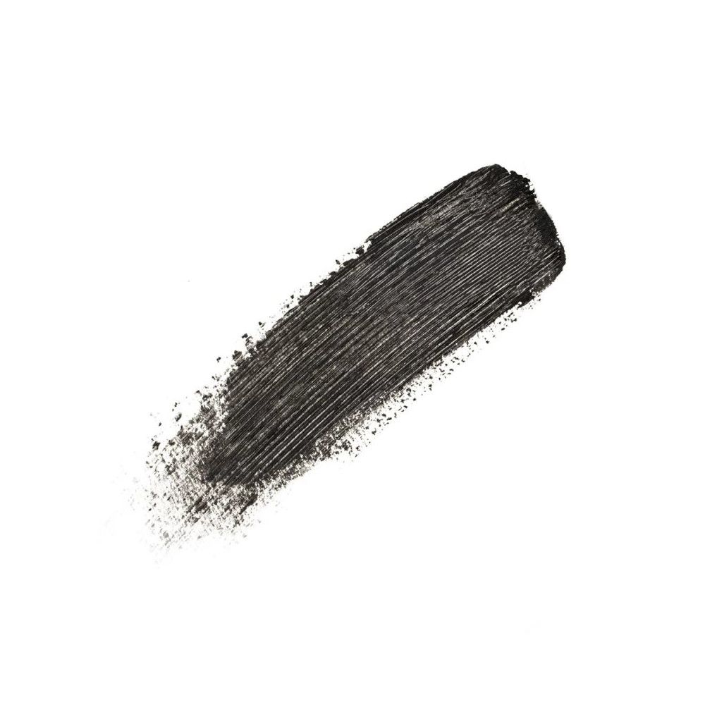 Zwarte mascara veeg op witte achtergrond. Textuur zichtbaar.