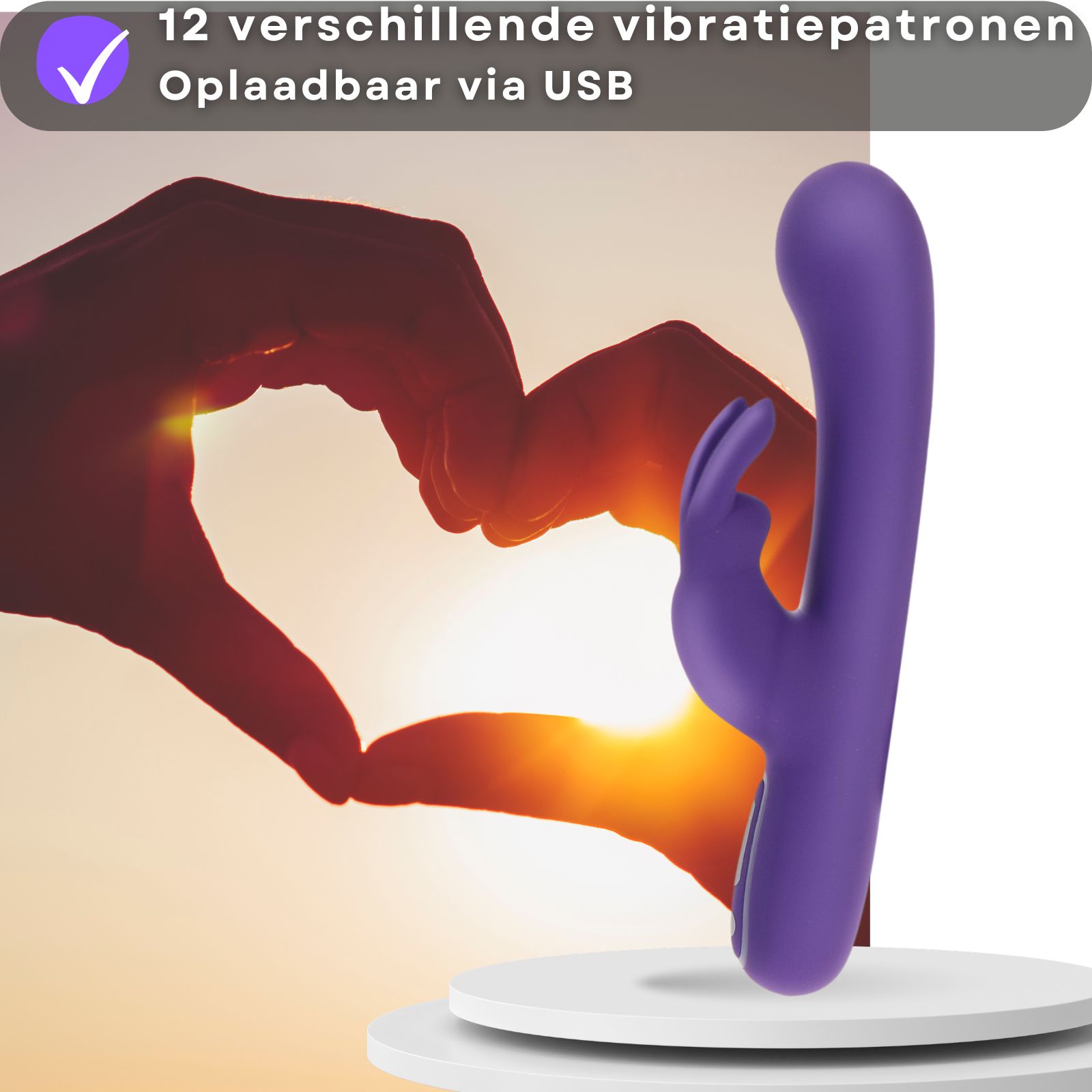 Paarse vibrator. 12 vibraties. USB oplaadbaar. Hart-silhouet op achtergrond.