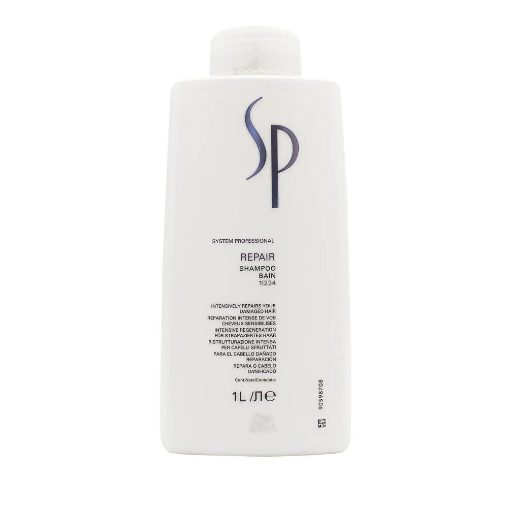 Witte shampoo fles met SP logo. Tekst: Repair Shampoo, 1L. Meertalige opschriften.