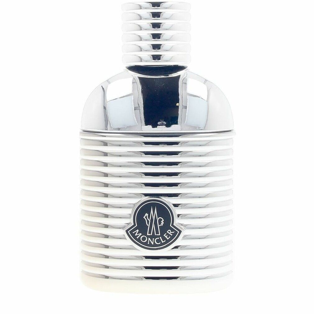 Flacon argenté. Logo Moncler sur le flacon. Surface cannelée. Bouchon cylindrique.