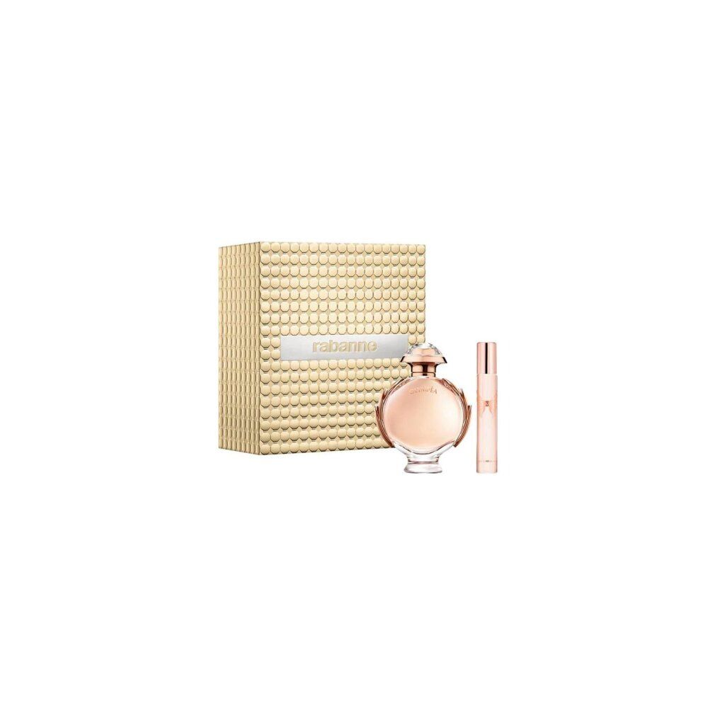 Paco Rabanne Olympea Giftset: parfumfles en reisverstuiver naast gouden geschenkdoos met ruitpatroon.
