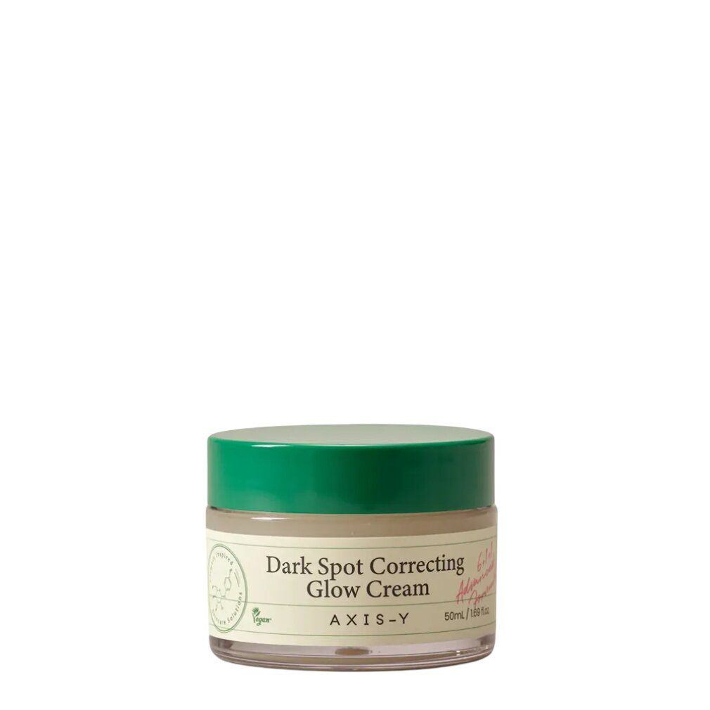 Pot de crème avec couvercle vert. Contient la crème 'Dark Spot Correcting Glow Cream' d'AXIS-Y.