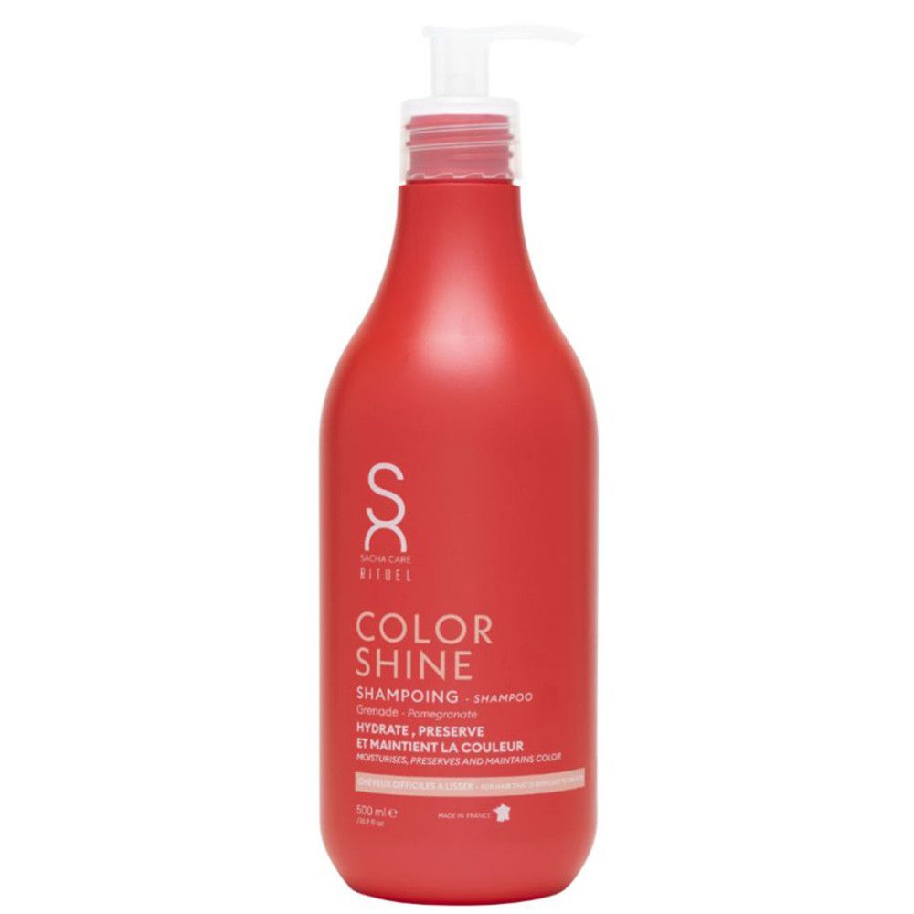 Rode shampoo fles met witte pomp. Opschrift: Color Shine, Shampoo. Bevat granaatappel. Gemaakt in Frankrijk.